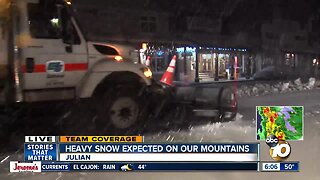 Heavy snow falls on mountains