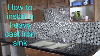 Install heavy cast iron sink