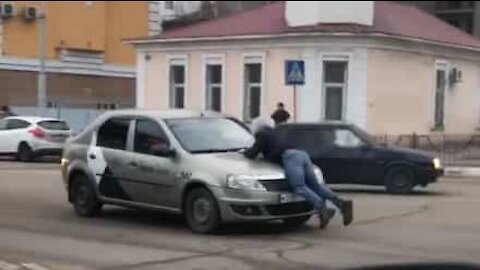 Customer taxi driver prefers hood of the car