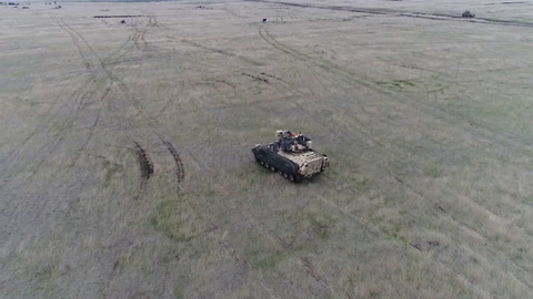 US and Romanian forces train in the wind and rain