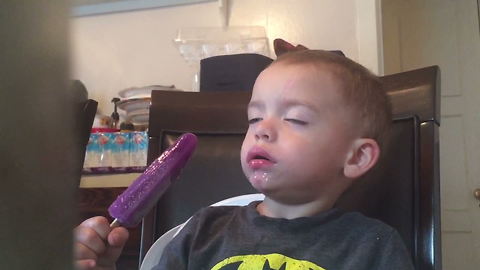 Tot Boy Falls Asleep As He Eats A Popsicle