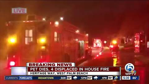 Family of 4 displaced by West Palm Beach townhouse fire