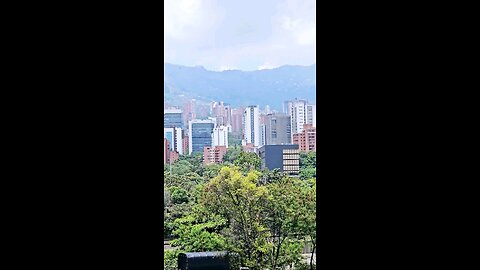 Walking on the bridge by Poblado