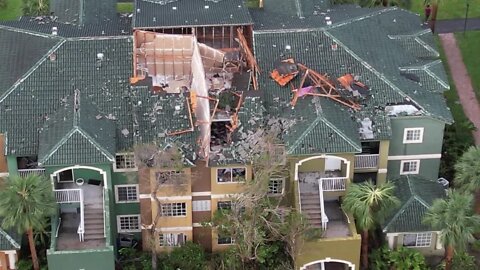 Drone footage shows roof damage to Sanctuary Cove apartments