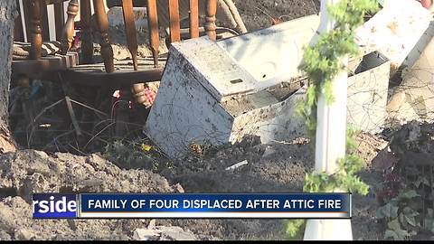 Boise family of four displaced after attic fire