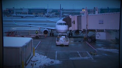 Woman believes her drink was spiked while waiting for flight at Denver International Airport