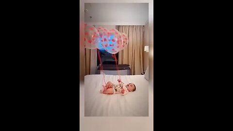 cute baby play with balloons