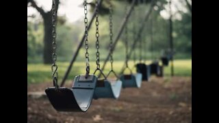 Toddler slips up on play swing