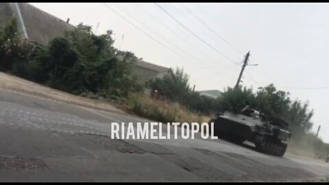 Russian military equipment rolls through Melitopol on the way to the Kherson front