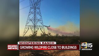 Fire crews battling wind-fueled brush fire near Wittmann