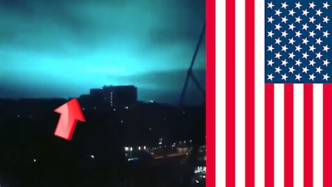 Green siren-like light in cloudy sky over New York City USA [Conspiracy]