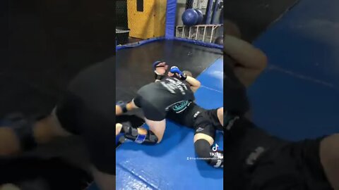 Ear slap low single arm bar