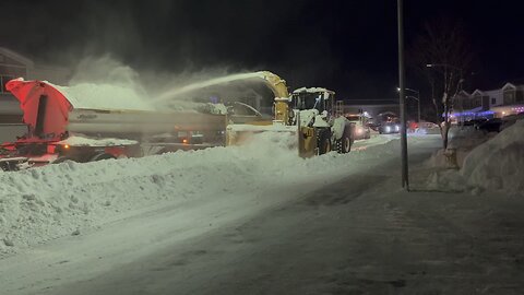 JBER Alaska, street cleaning with a snowblower