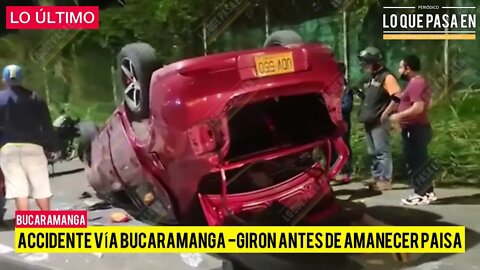 Carro volcado el la vía a Giron