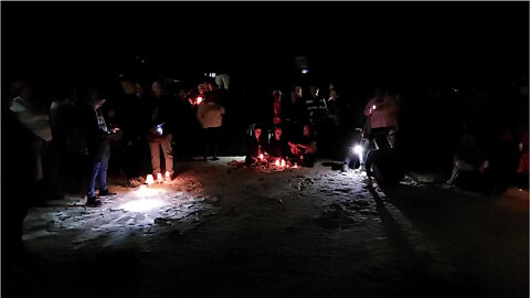 Watch: Candlelight Vigil for Missing German Tourist