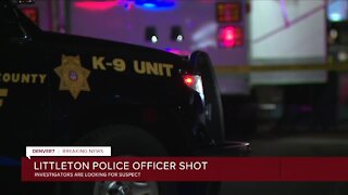 Littleton police officer shot, manhunt underway for suspect