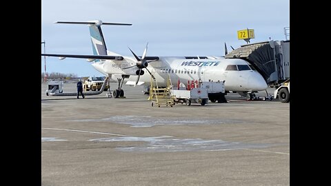 WESTJET Flight #WS3339 fueling up and off to COMOX De Havilland Dash 8