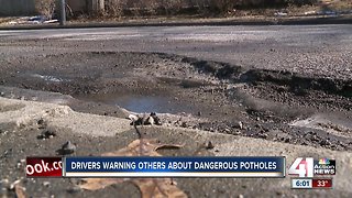 Massive pothole on Ward Parkway causing major damage to cars