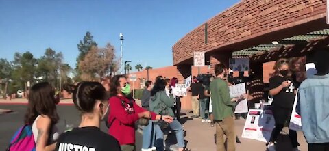 Protesters rally outside of Clark County Government Center right now