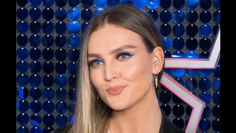 Little Mix's Perrie Edwards suffers tear in base of spine