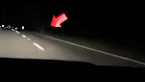 Hard to see but a mysterious figure running at the same speed as a car [Ghost]