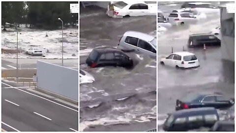 JAPAN - TSUNAMI CAUGHT ON CAMERA - OCEAN OVERTOPS WALL