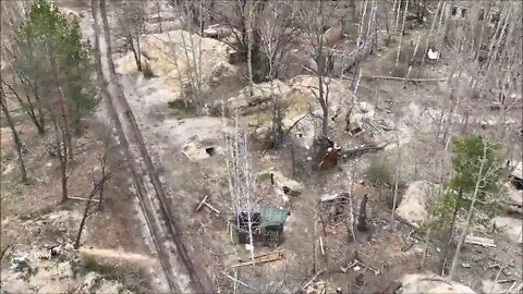 Drone Flyover of abandoned Russian camp in Chernobyl. Russians dug trenches in radioactive soil.