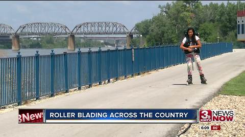 Girl rollerblading across the country