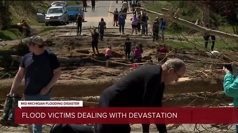 'He was watching houses float down the river.' Residents face devastation of Mid-Michigan dam breach