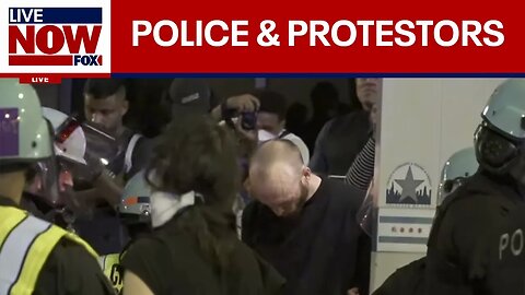 DNC protestors clash with police outside the Chicago United Center