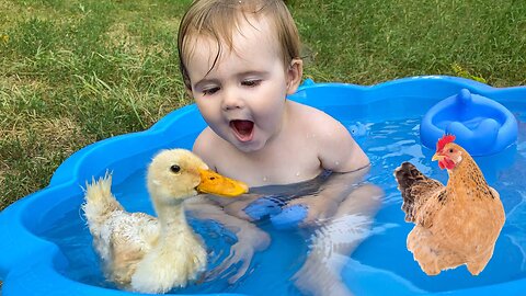 #Funny baby reaction to duckling in the pool#