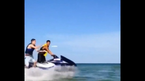 Watch This Epic Jet Ski Frisbee Trick Shot