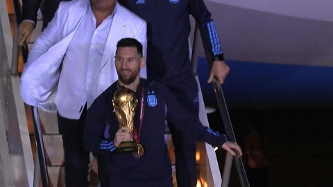 Messi and the Argentinian football team arrive at airport after World Cup win | AFP