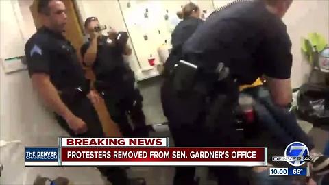 Disability advocates arrested by Denver police during sit-in at Cory Gardner's office