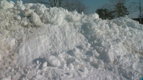 Dangers of snow piles after snowstorm