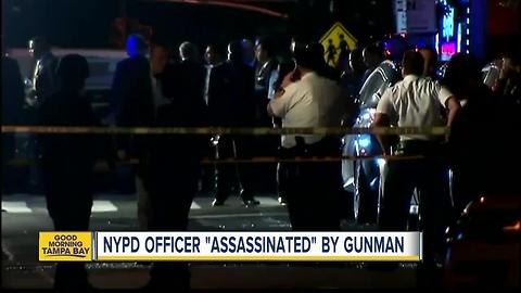 NYPD officer 'assassinated' by gunman