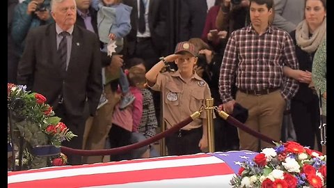 Boy Scout salutes George H.W. Bush