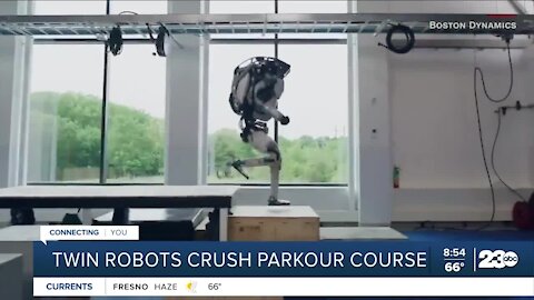 Twin robots crush parkour course