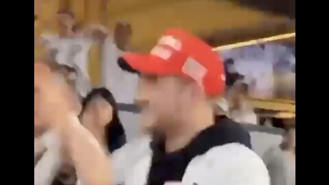 Man tries to steal MAGA hat ... UNITES OPPOSING TEAMS