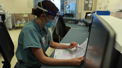 U.S. Air Force Capt. Ashley Mills works alongside Arrowhead Regional Medical Center Personnel