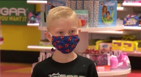 Boy who saved sister from dog gets shopping spree