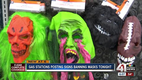 Gas stations post signs banning masks on Halloween