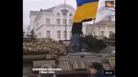 Ukrainians Cheer and Ride Russian Armored Vehicle