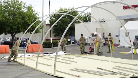 Airmen build tents, increase COVID patient care during surge