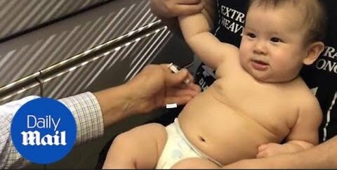 Doctor distracts baby from her shots with goofy tune