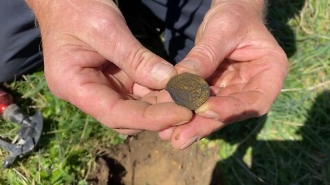 The Hammered Chinese Village Coin