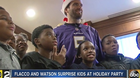 Ravens surprise 5th graders from Westport Academy with gifts