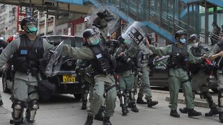 Police Fire Tear Gas On Hong Kong Protesters