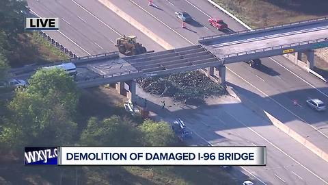 Demolition underway on I-96 overpass after semi crash