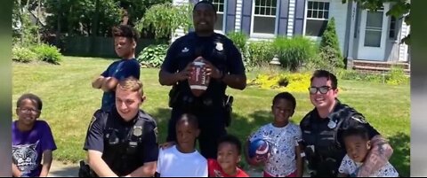 Cops join kids playing football